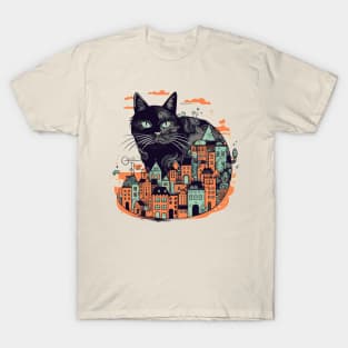 Black cat sitting in front of a colourful city T-Shirt